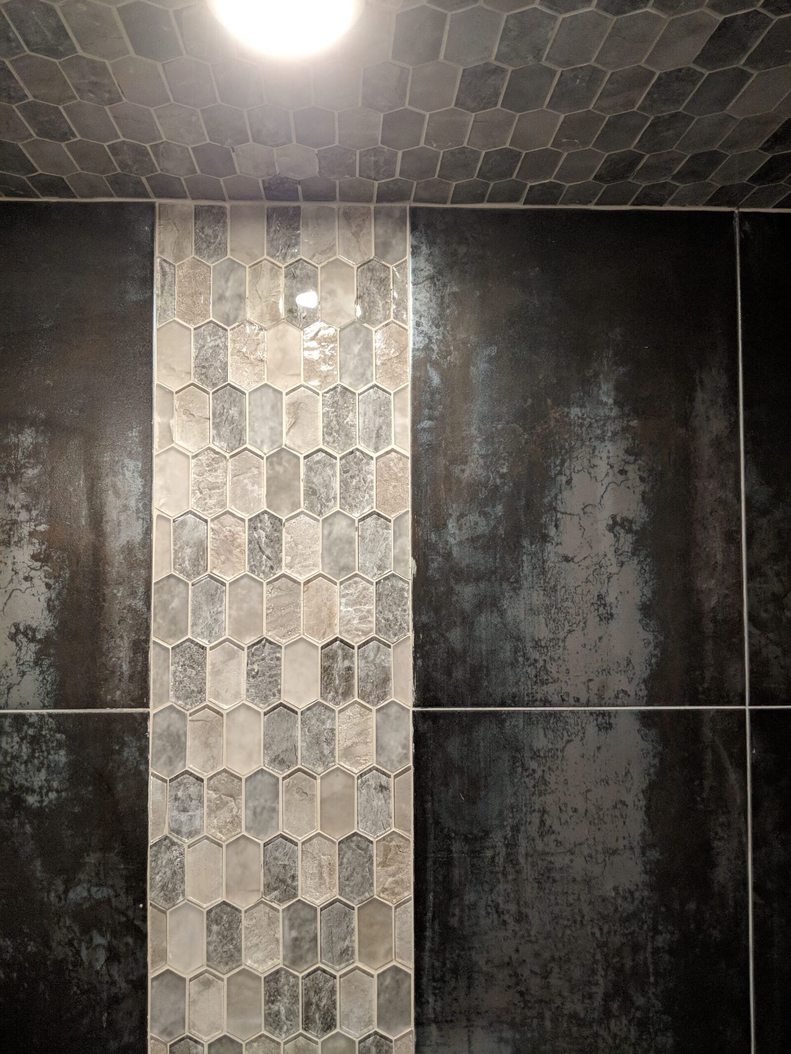 Vaughan finished basement: tiled shower with mosaic accent