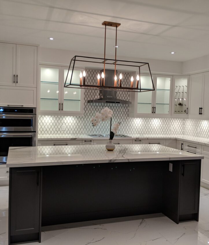 Brampton white kitchen: second angle with the dark island and white cabinetry