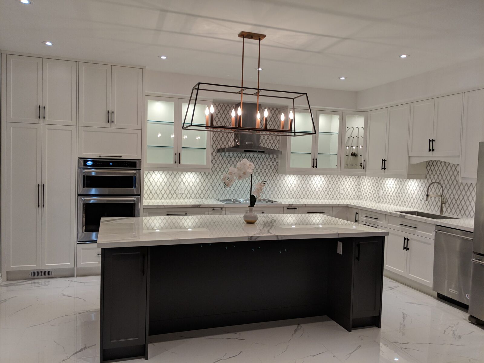 Brampton white kitchen: second angle with the dark island and white cabinetry