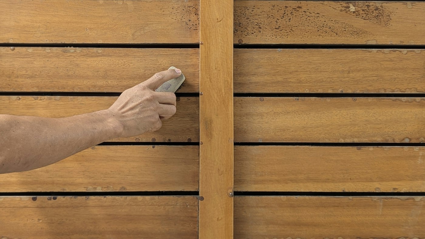 Sanding and cleaning come before any stain or paint.